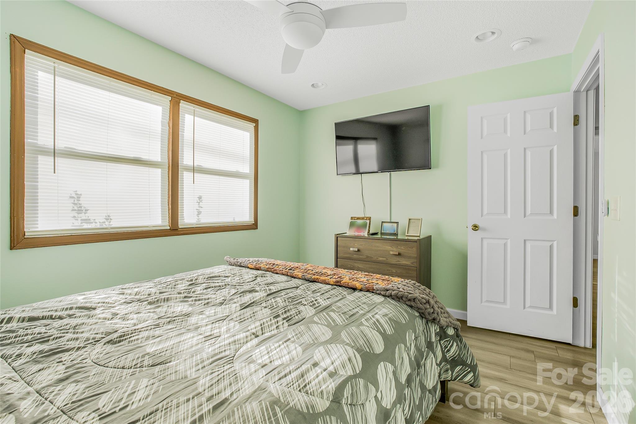 463 Winfree Road Wadesboro, NC 28170 - Photo 18 of 19 a bedroom with a bed and a window