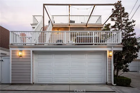 a view of balcony with furniture and plants