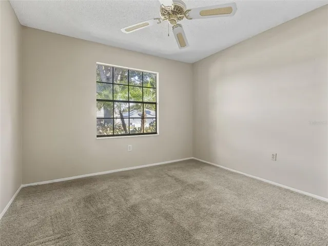 a view of an entryway with a floor to ceiling window