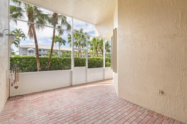 a view of a lake with houses in the back
