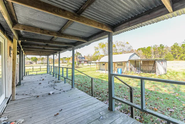 a view of outdoor space with wooden deck