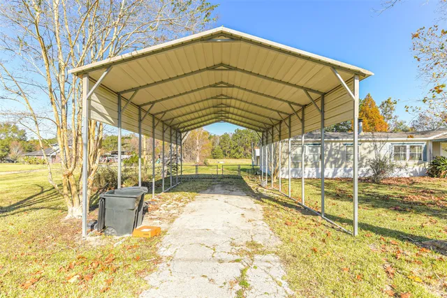 a view of a swimming pool with a patio