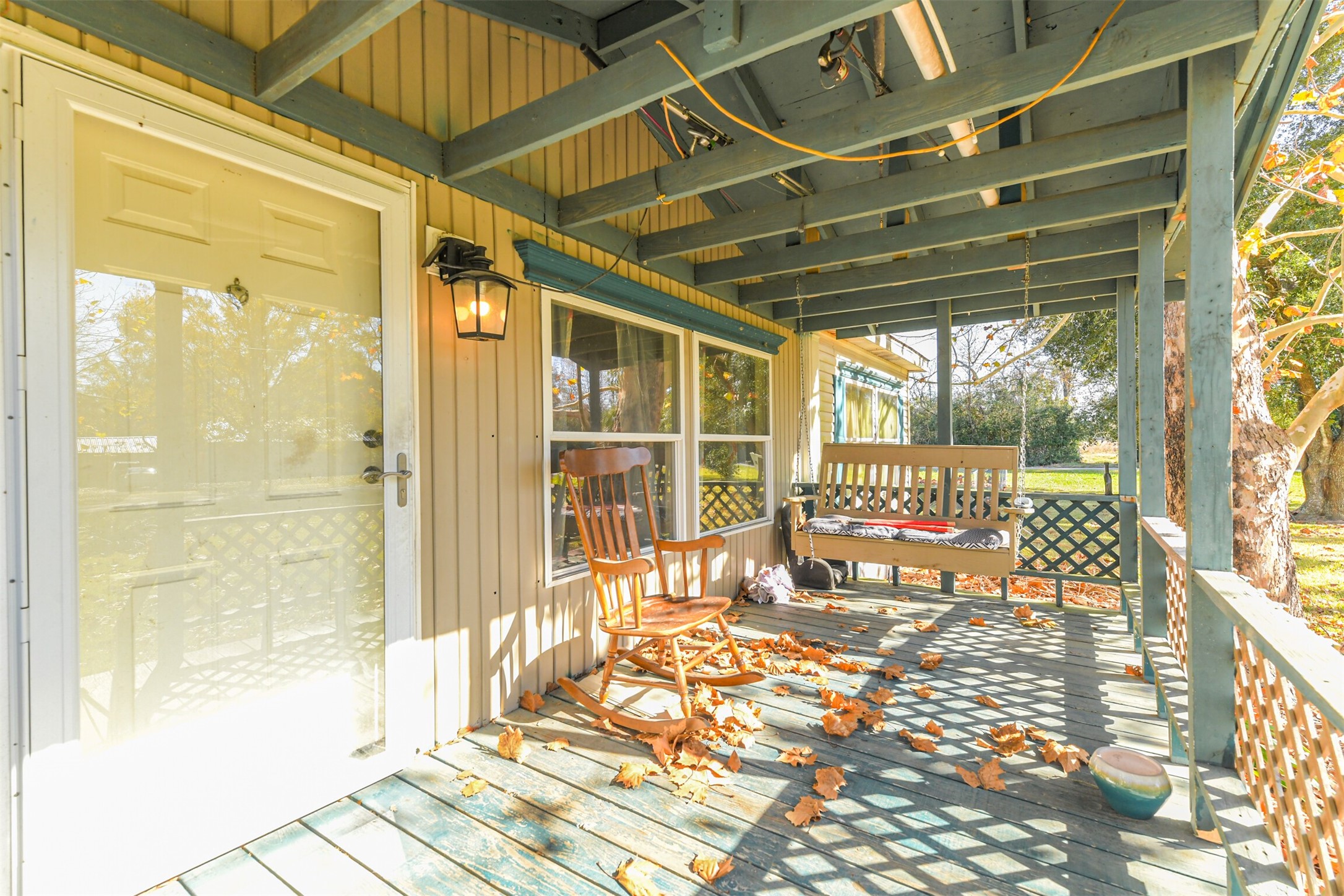 18 County Road 2236 Cleveland, TX 77327 - Photo 7 of 28 a room with wooden floor and windows