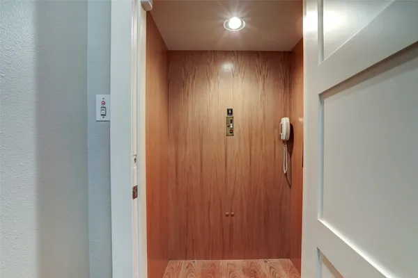 a view of hallway with shower