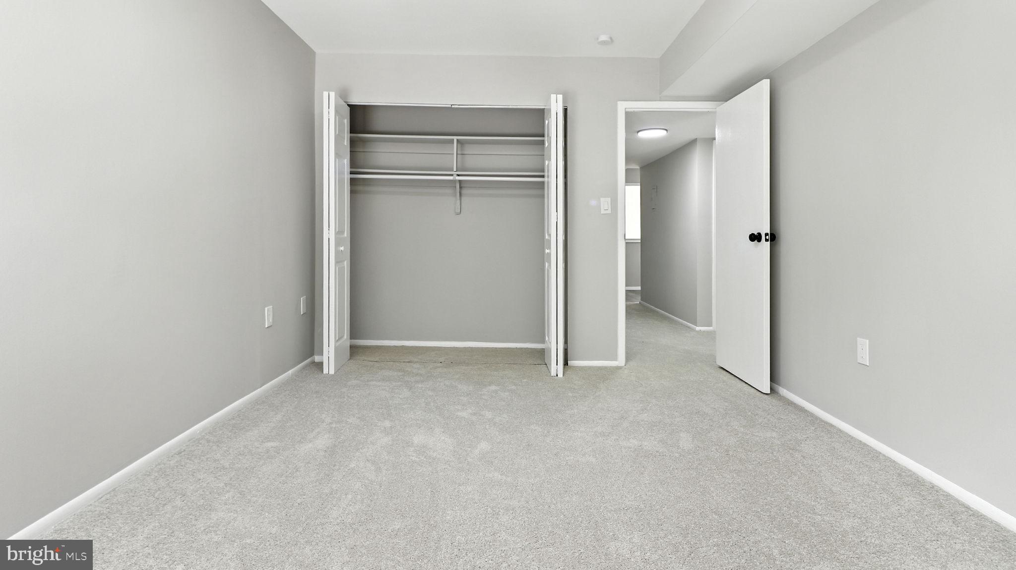 8693 Greenbelt Road, Unit 202 Greenbelt, MD 20770 - Photo 37 of 40 an empty room with closet area