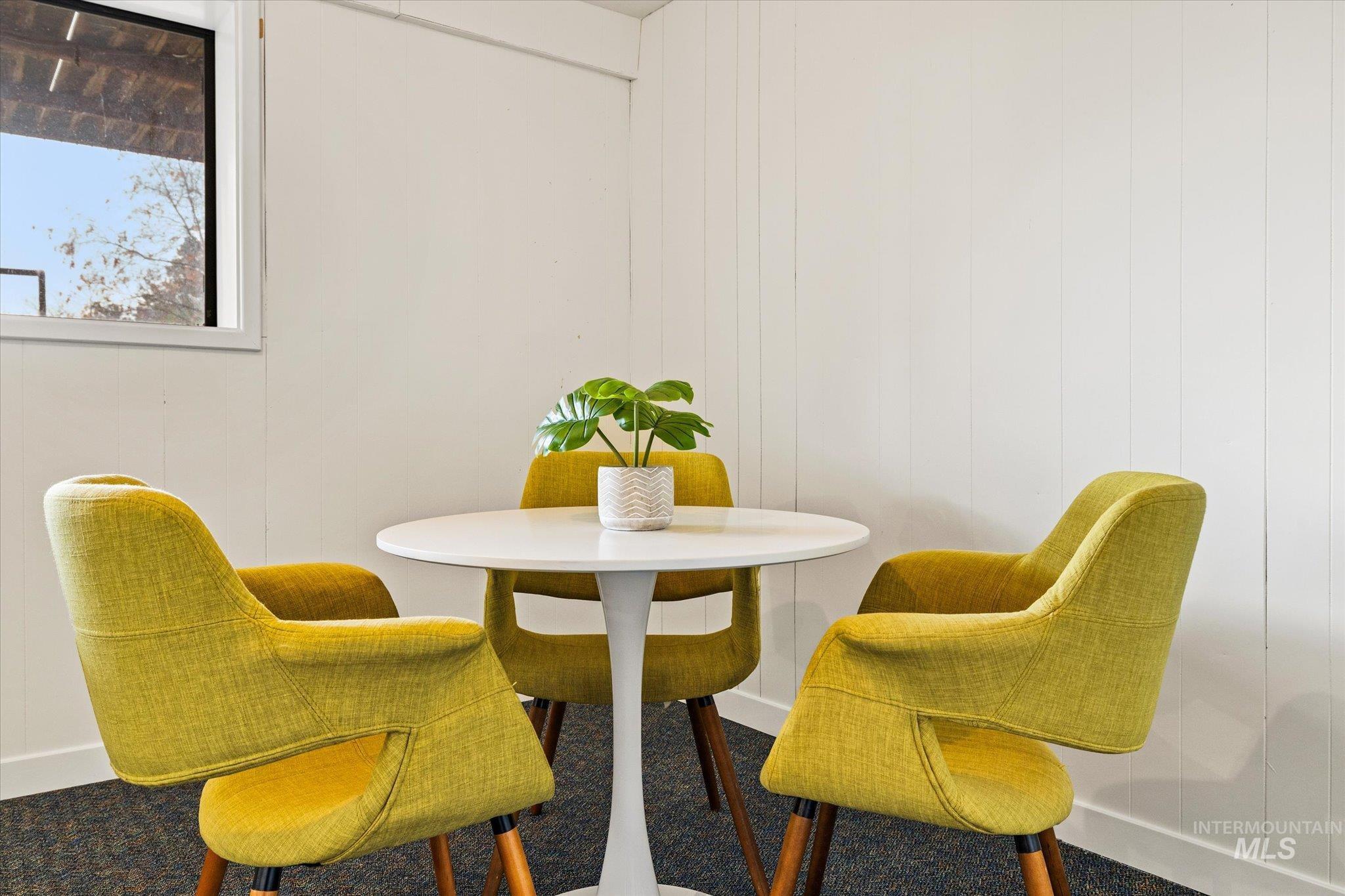 419 West Logan Street Caldwell, ID 83605 - Photo 38 of 50 Dining space with wooden walls