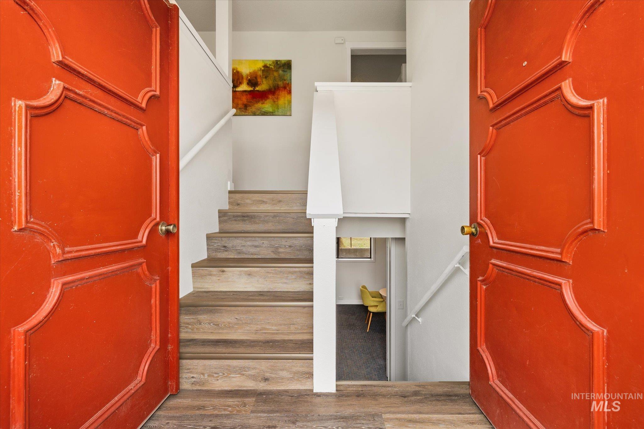 419 West Logan Street Caldwell, ID 83605 - Photo 6 of 50 Staircase featuring wood finished floors