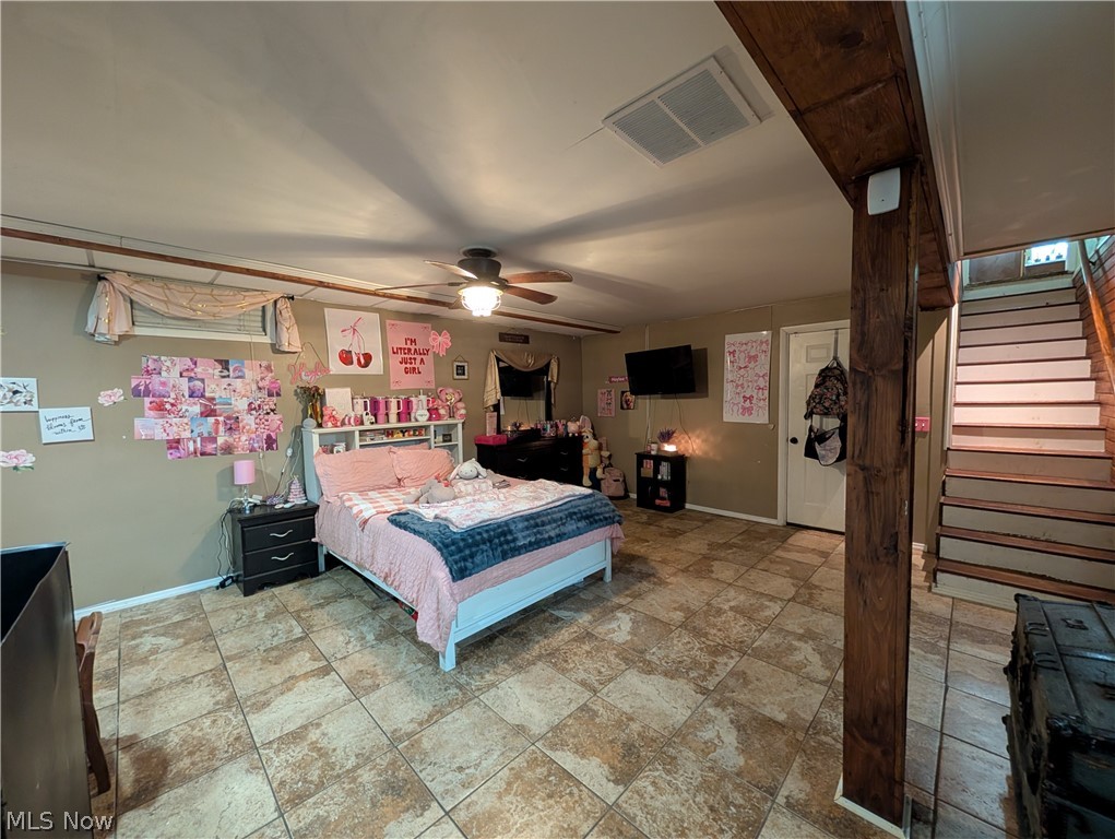 6700 McCaslin Road Nashport, OH 43830 - Photo 28 of 30 Spacious room with large format tile flooring and a ceiling fan