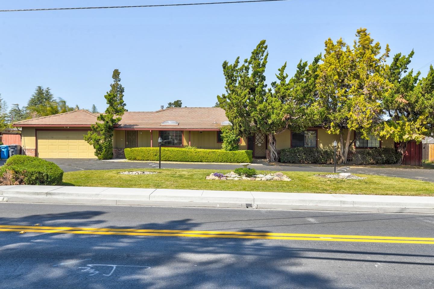 20865 McClellan Road Cupertino, CA 95014 - Photo 1 of 13 a view of swimming pool with deck and yard