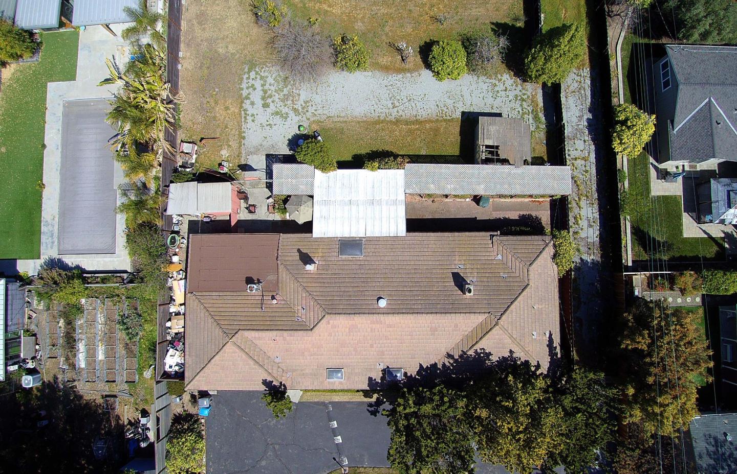 20865 McClellan Road Cupertino, CA 95014 - Photo 3 of 13 an aerial view of residential houses with outdoor space
