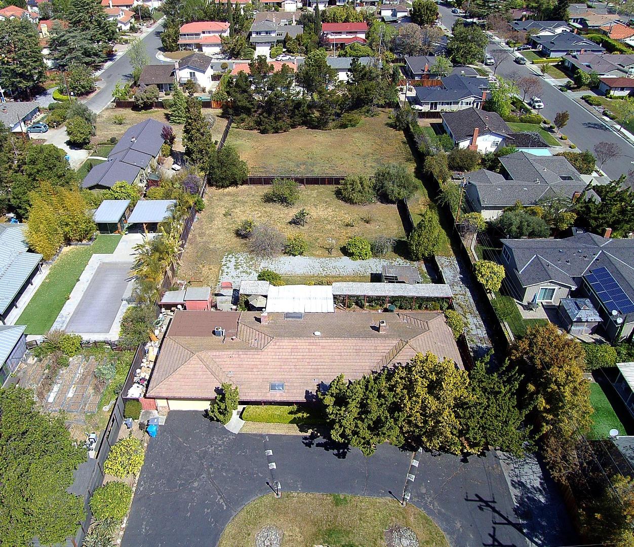 20865 McClellan Road Cupertino, CA 95014 - Photo 4 of 13 an aerial view of residential houses with outdoor space
