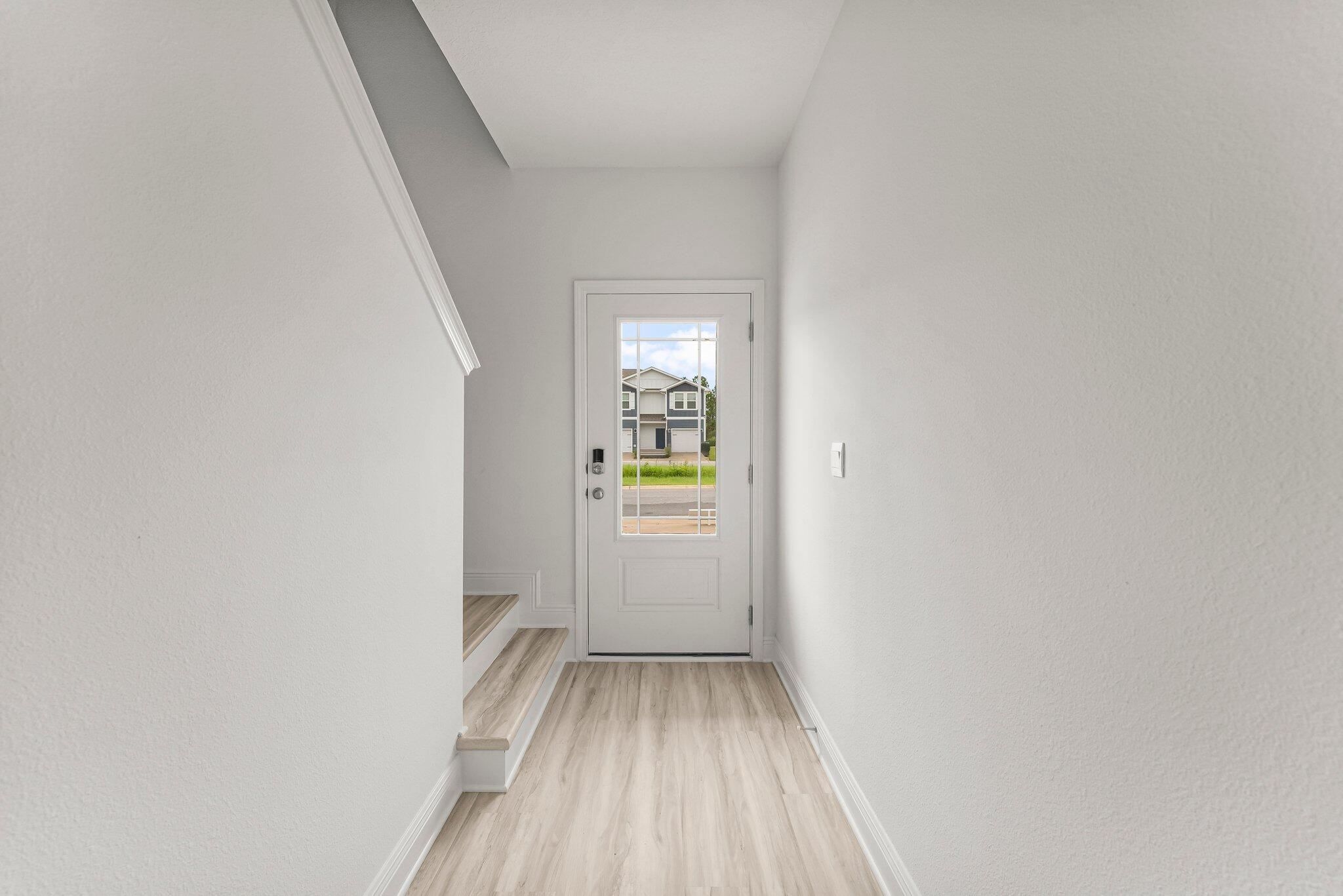 44 Hawk Street Santa Rosa Beach, FL 32459 - Photo 8 of 34 a view of a hallway with wooden floor