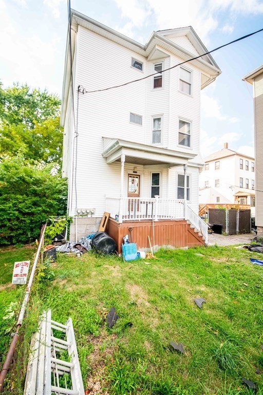 119 Lapham Street Fall River, MA 02721 - Photo 1 of 29 a view of a house with a yard and sitting area