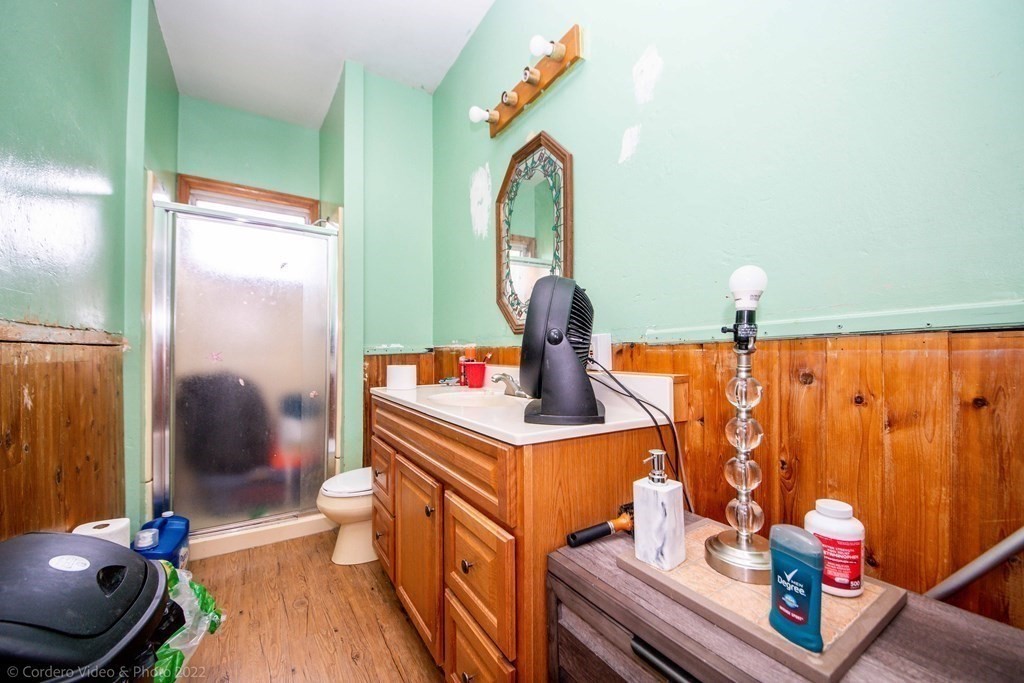 119 Lapham Street Fall River, MA 02721 - Photo 11 of 29 a view of living room with furniture and wooden floor
