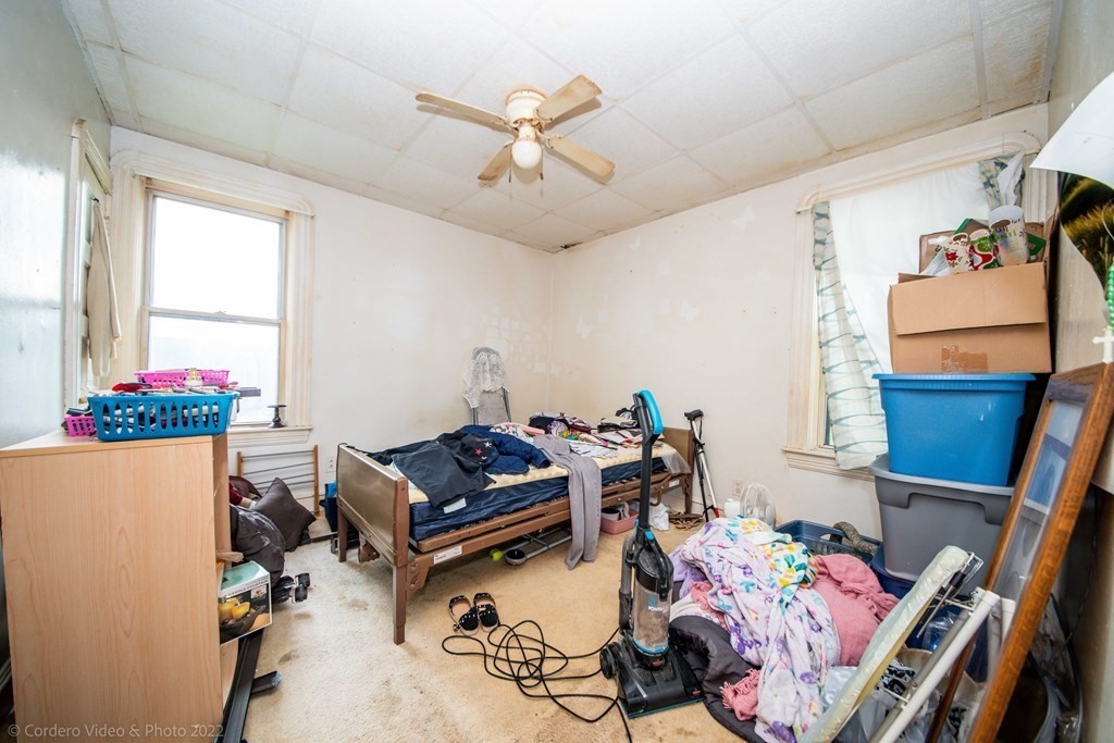 119 Lapham Street Fall River, MA 02721 - Photo 14 of 29 a room with furniture and gym equipment