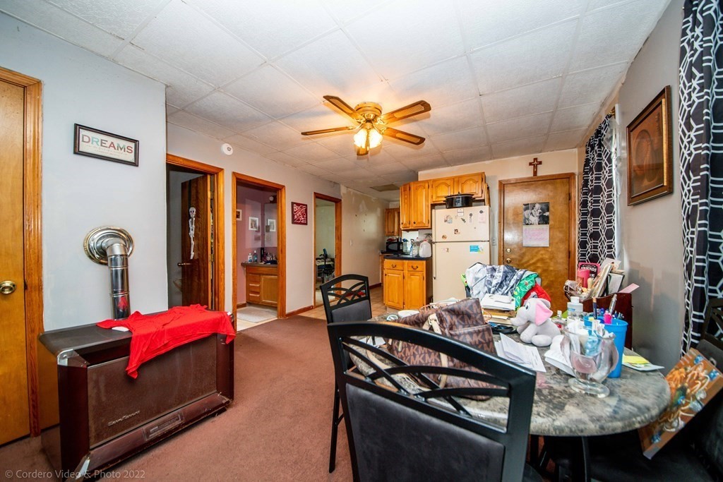 119 Lapham Street Fall River, MA 02721 - Photo 16 of 29 a room with furniture chess table and musical instruments