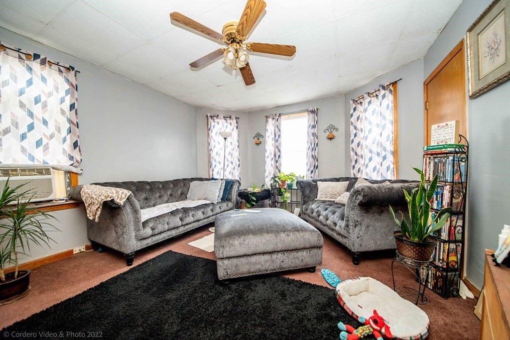 119 Lapham Street Fall River, MA 02721 - Photo 17 of 29 a living room with furniture and a large window