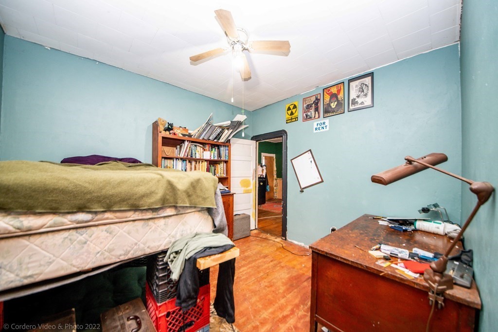 119 Lapham Street Fall River, MA 02721 - Photo 22 of 29 a bed room with a bed and a baby
