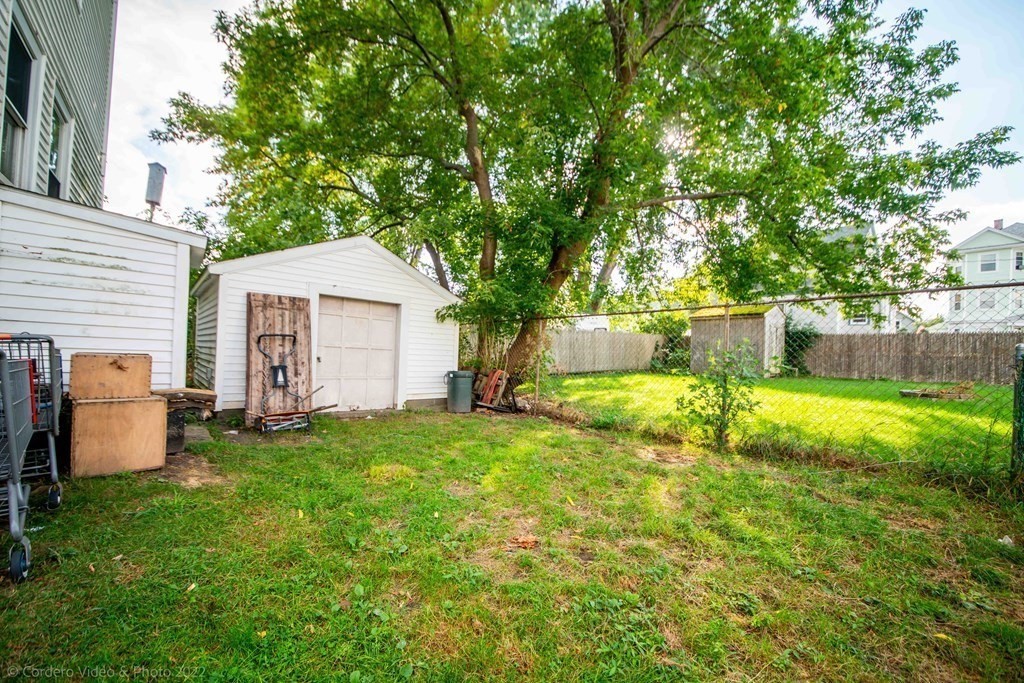119 Lapham Street Fall River, MA 02721 - Photo 3 of 29 a view of a house with backyard and a tree