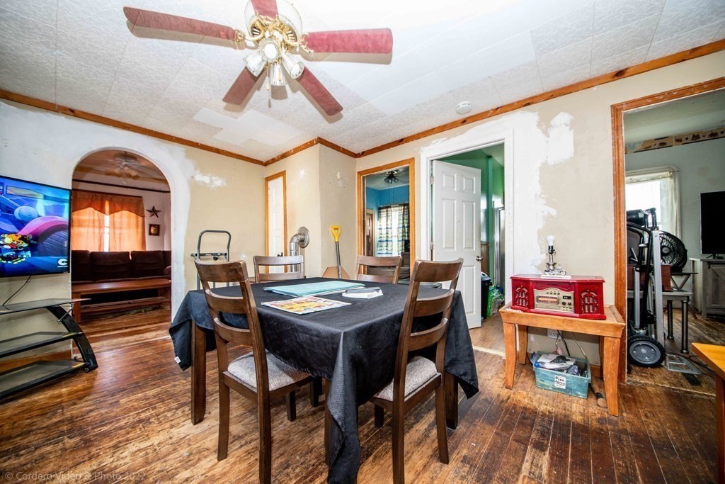 119 Lapham Street Fall River, MA 02721 - Photo 7 of 29 a view of a dining room with furniture and wooden floor