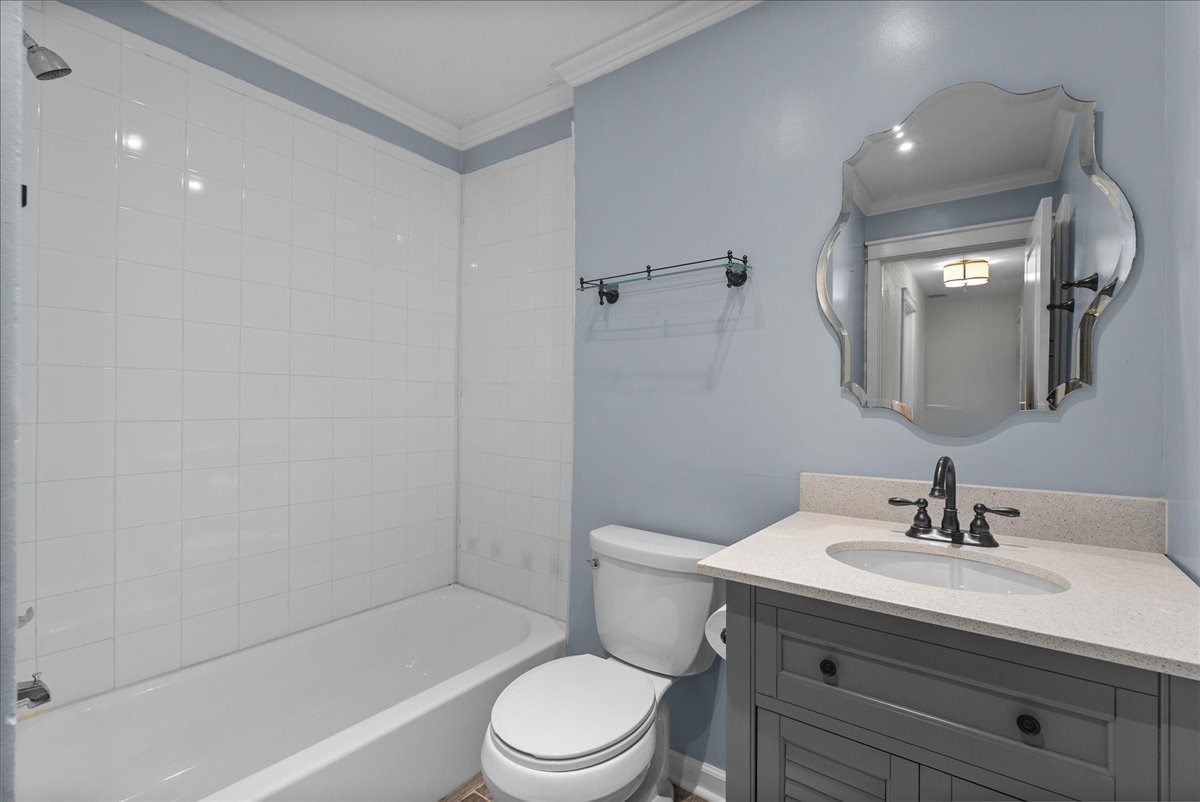 1572 Silverpines Road, Unit 572 Houston, TX 77062 - Photo 25 of 37 The second full bath upstairs is shared by the two secondary bedrooms, and it has also been tastefully painted and decorated to match the rest of the home.
