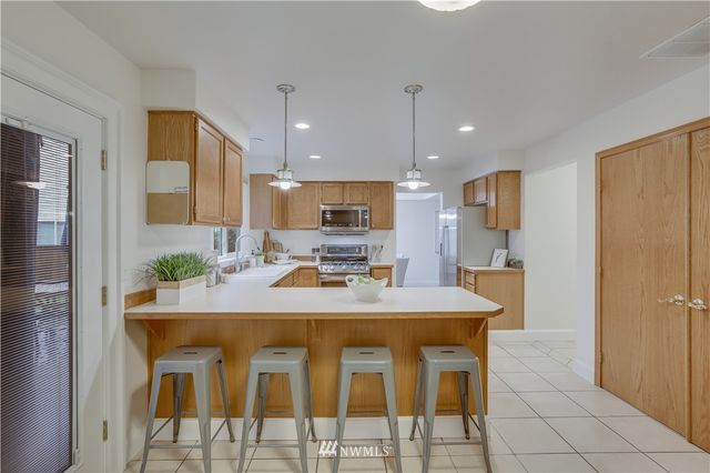 a view of a dining room with furniture
