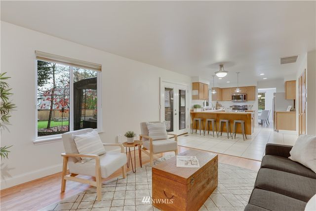 a living room with furniture and a table