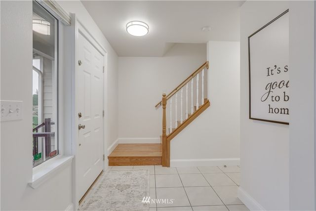 a view of an entryway with staircase