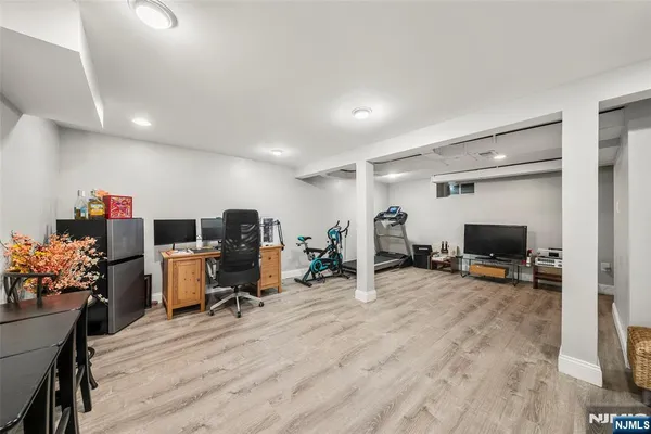 a view of a workspace with furniture and a livingroom