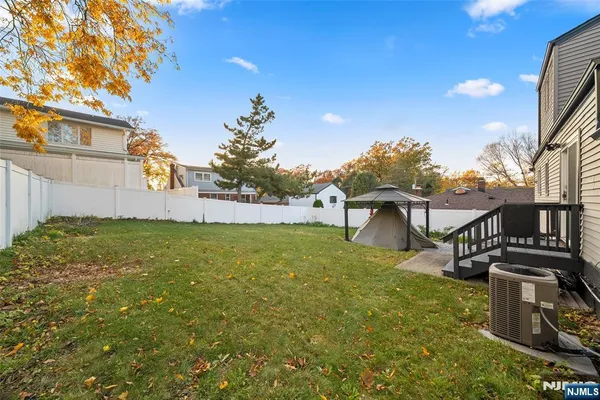 a view of a yard in front of a house