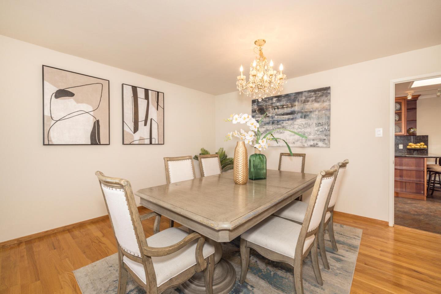 873 Morningside Drive Millbrae, CA 94030 - Photo 14 of 47 a view of a dining room with furniture and wooden floor