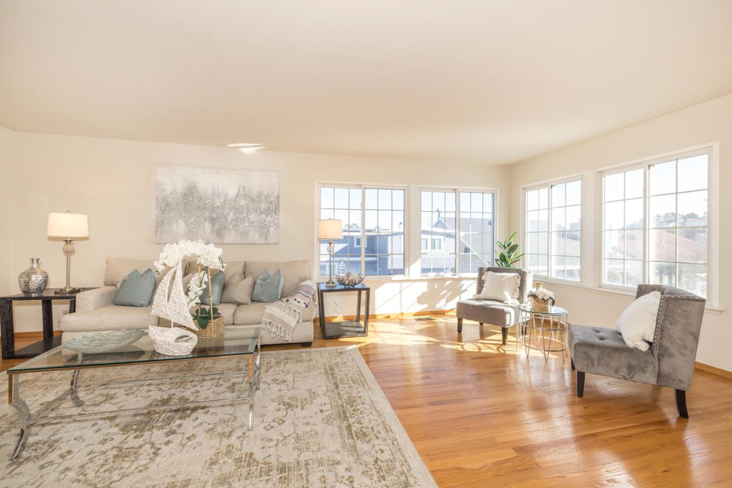873 Morningside Drive Millbrae, CA 94030 - Photo 16 of 47 a living room with furniture and a large window