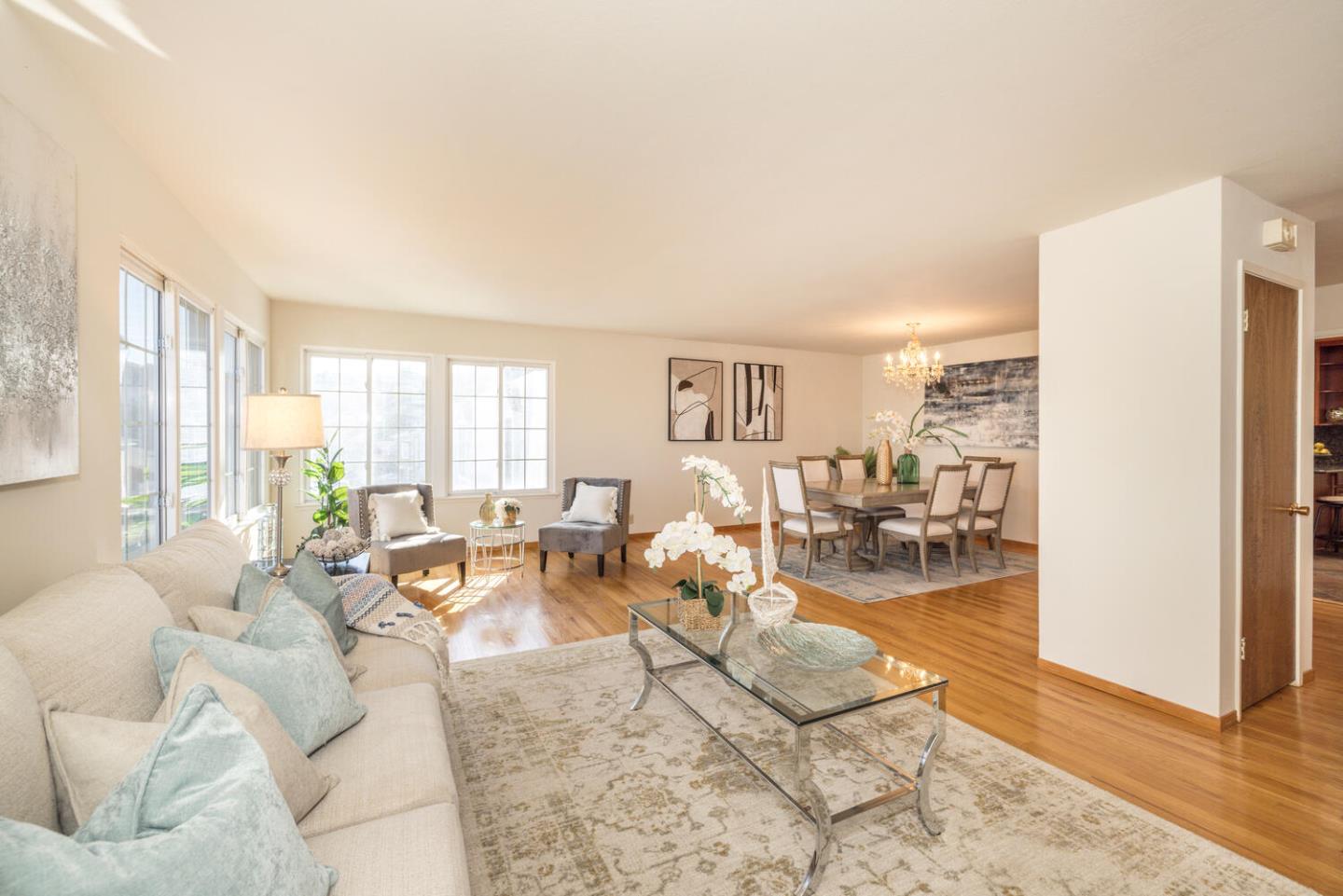 873 Morningside Drive Millbrae, CA 94030 - Photo 18 of 47 a living room with furniture and a large window