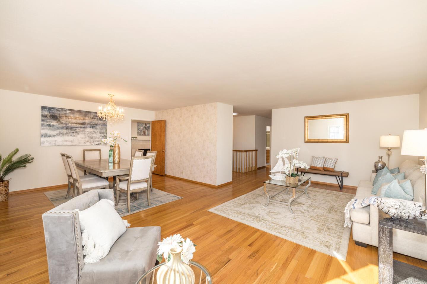 873 Morningside Drive Millbrae, CA 94030 - Photo 19 of 47 a living room with furniture and a table