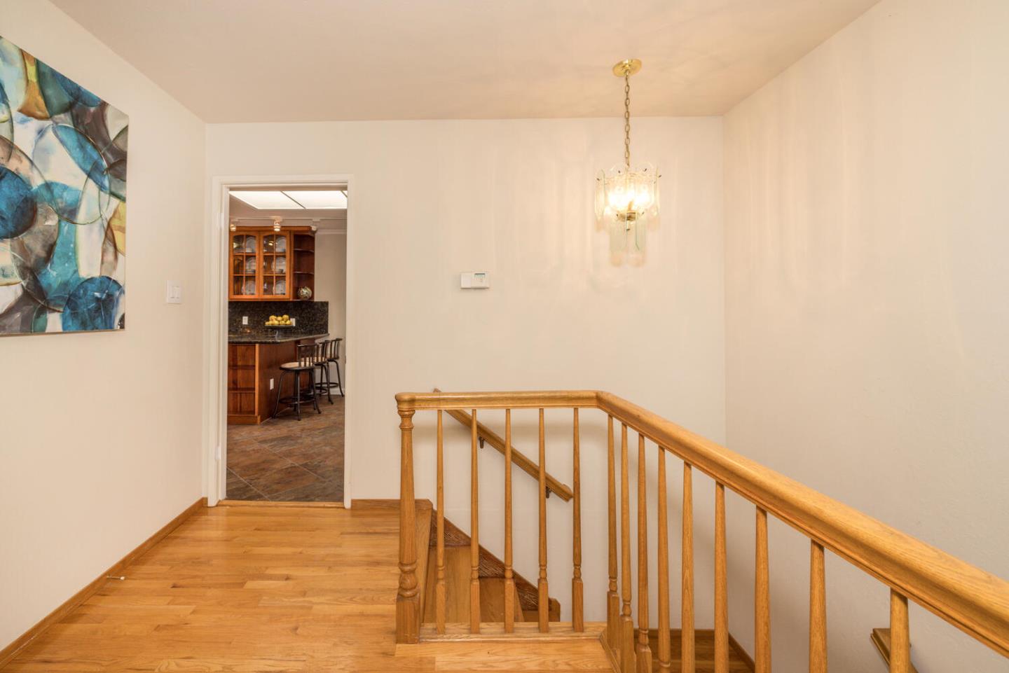 873 Morningside Drive Millbrae, CA 94030 - Photo 20 of 47 a view of a hallway with windows