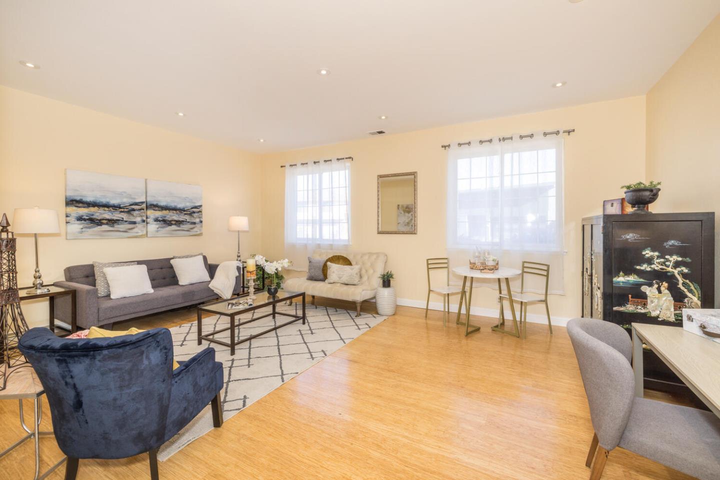873 Morningside Drive Millbrae, CA 94030 - Photo 25 of 47 a living room with furniture and a window