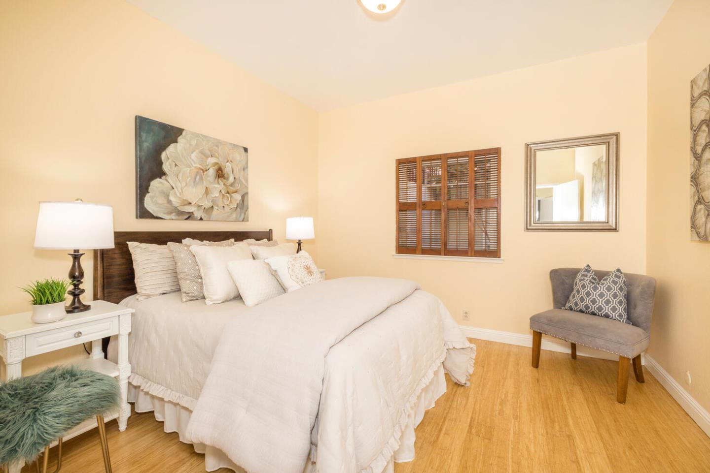 873 Morningside Drive Millbrae, CA 94030 - Photo 29 of 47 a bedroom with a bed and a couch