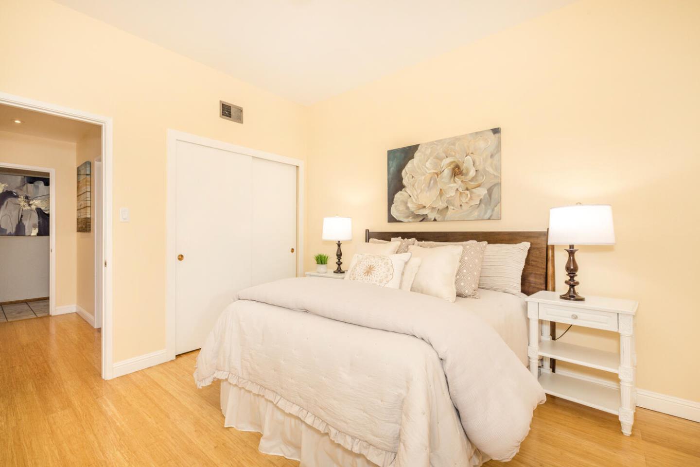 873 Morningside Drive Millbrae, CA 94030 - Photo 30 of 47 a bed room with a bed and a night stand