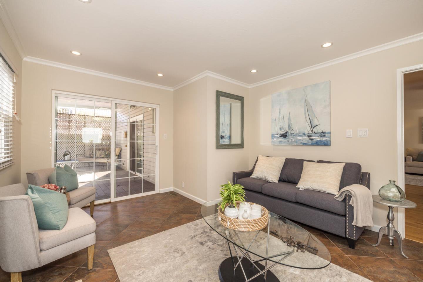 873 Morningside Drive Millbrae, CA 94030 - Photo 6 of 47 a living room with furniture and a large window