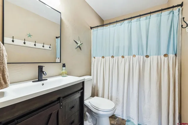 a room with furniture and wooden floor