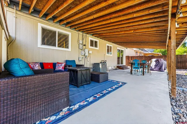 a view of a backyard with plants and a backyard