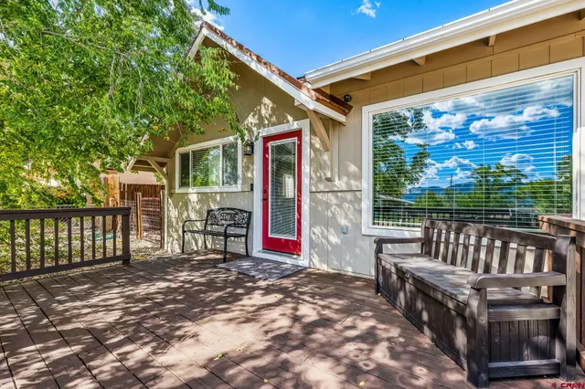 a view of porch with a bench