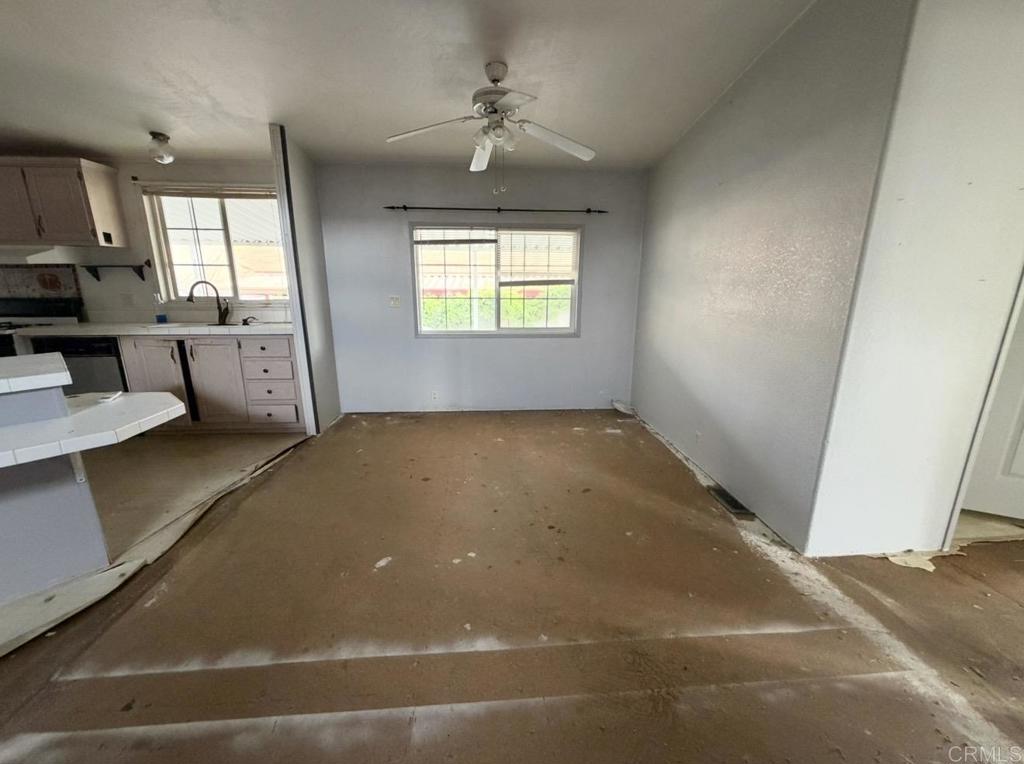 1638 Calavo Road, Unit 63 Fallbrook, CA 92028 - Photo 5 of 9 a view of a room with window and a ceiling fan