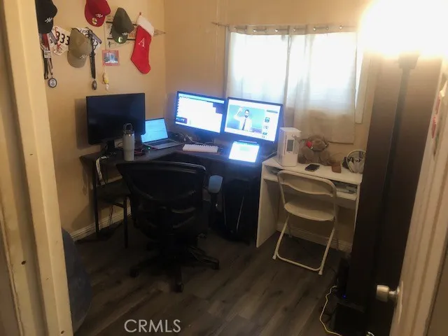 16600 Downey, Unit 115 Paramount, CA 90723 - Photo 10 of 15 a view of a workspace with furniture and a window