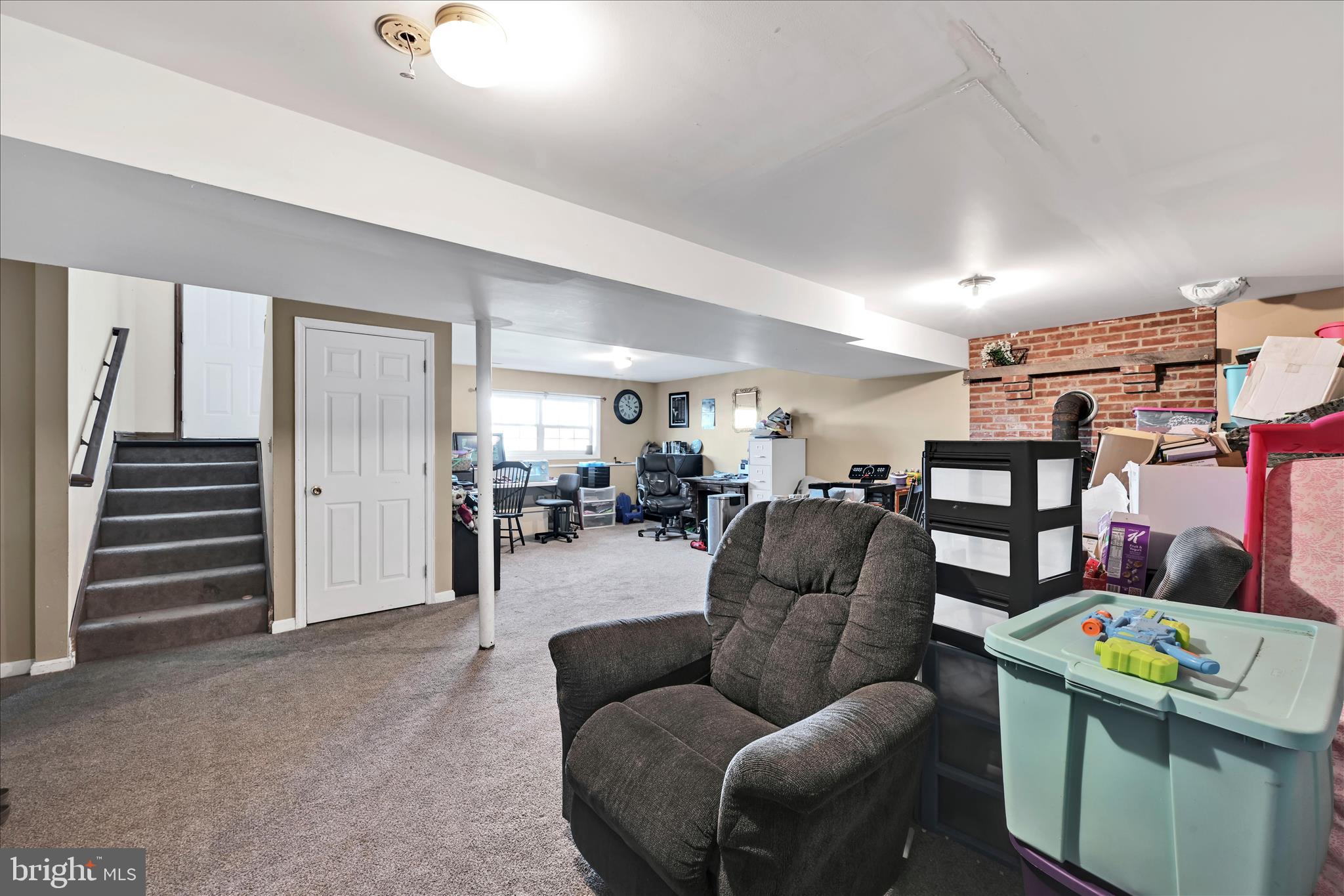 411 Red Hill Road Pequea, PA 17565 - Photo 28 of 50 a living room with furniture and a kitchen