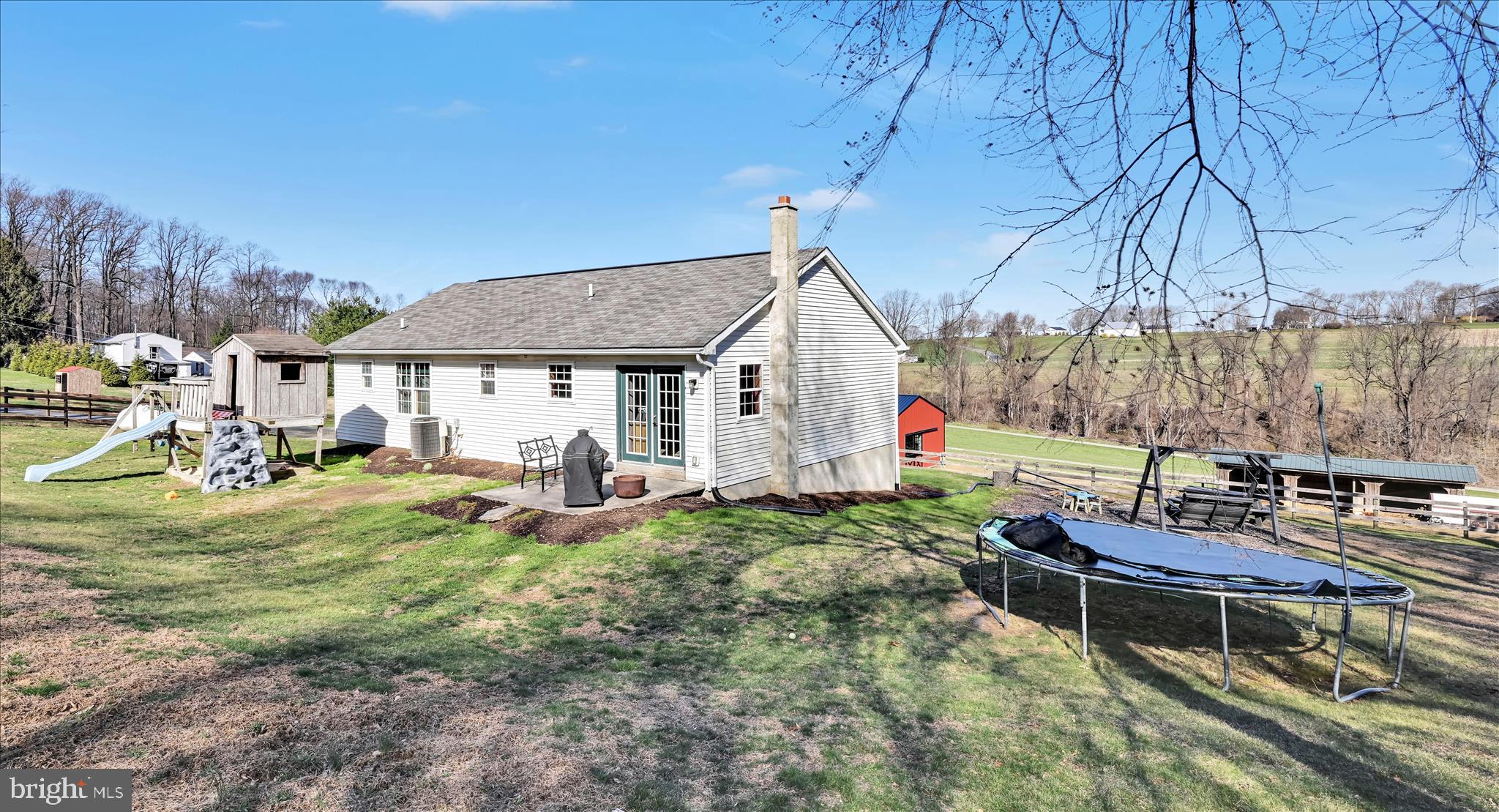 411 Red Hill Road Pequea, PA 17565 - Photo 33 of 50 a view of an house with backyard space and sitting area