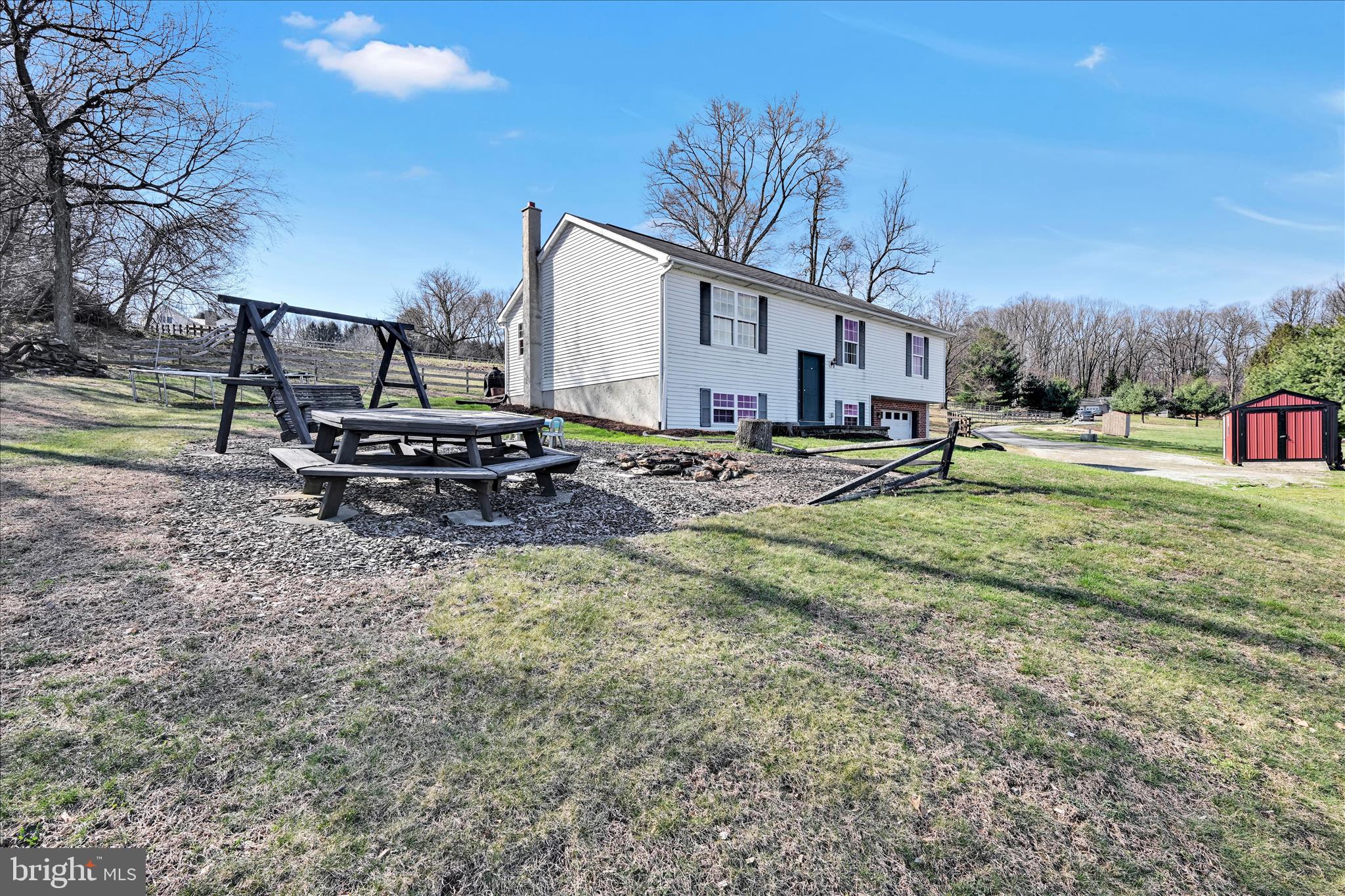 411 Red Hill Road Pequea, PA 17565 - Photo 35 of 50 a view of a house with backyard and sitting area