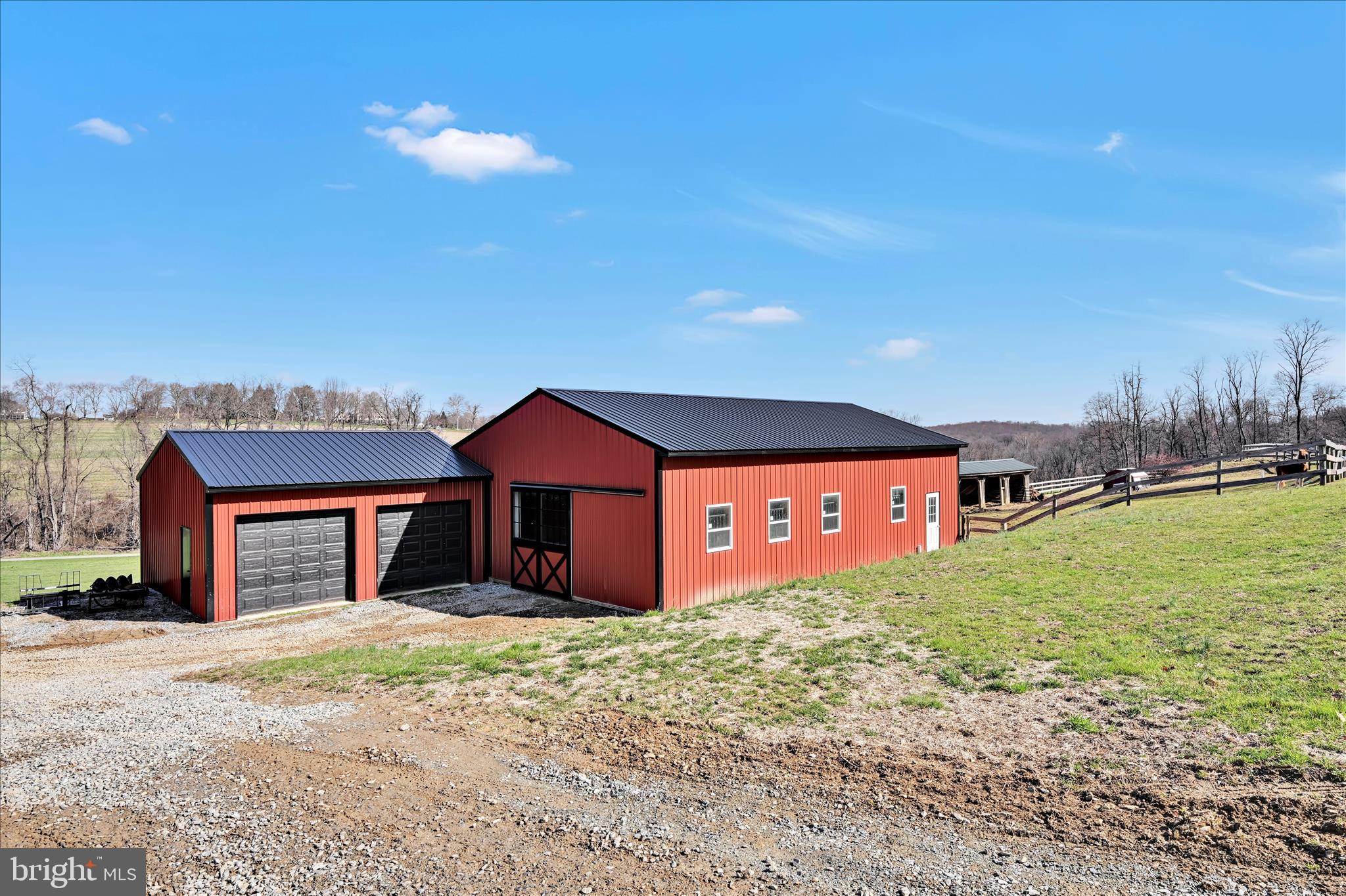 411 Red Hill Road Pequea, PA 17565 - Photo 43 of 50 a front view of a house with a yard and garage