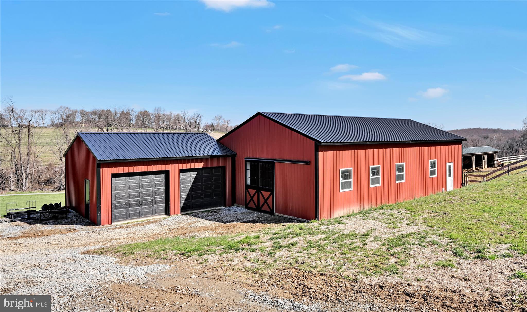 411 Red Hill Road Pequea, PA 17565 - Photo 44 of 50 a front view of a house with a yard and garage