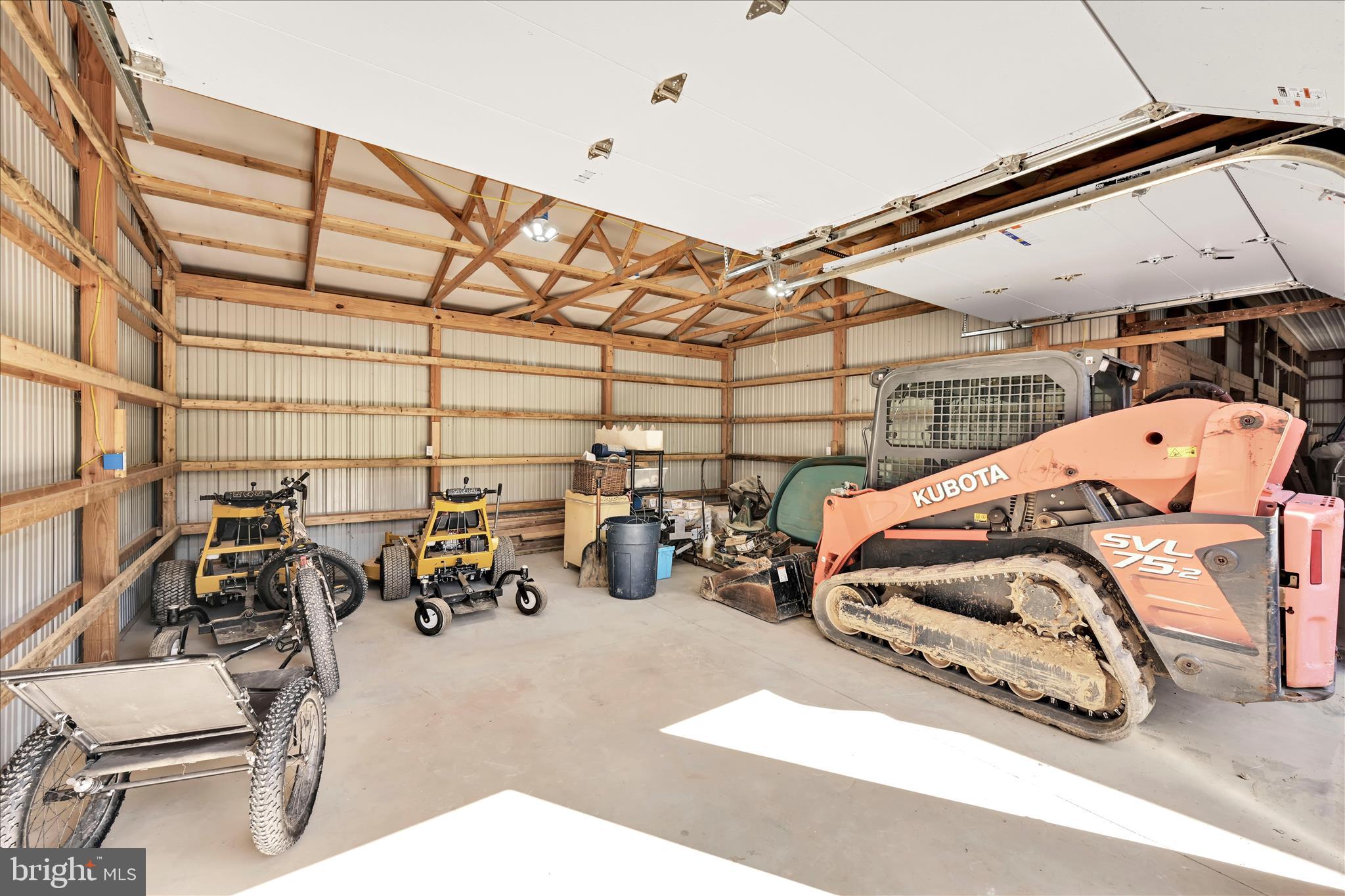 411 Red Hill Road Pequea, PA 17565 - Photo 45 of 50 a view of parking garage with cars